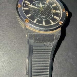 Salvatore Ferragamo F-80 Black Watch with Gold Accents, missing a bold for band